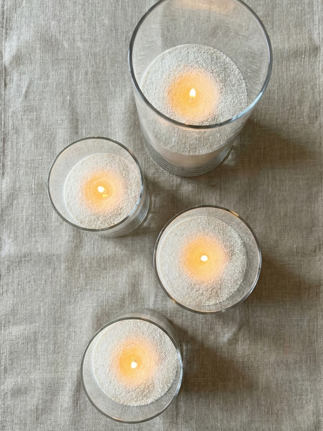 Decorative wedding candles styled for a reception setting