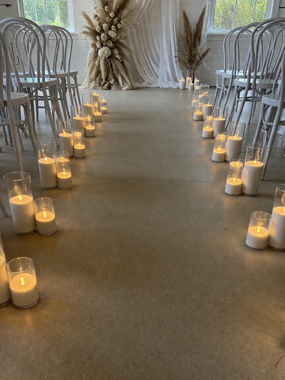 Wedding candle styling with a warm evening glow